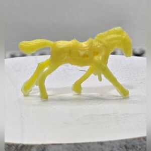 Vintage Tiny Yellow Plastic Horse -Cracker Jack Prize or Gumball Machine Toy
